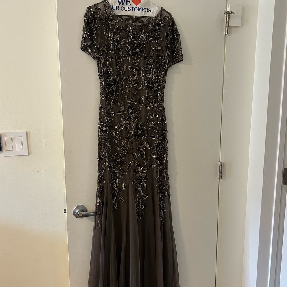 Brown champagne colored sequin evening gown size 8.  Worn twice.